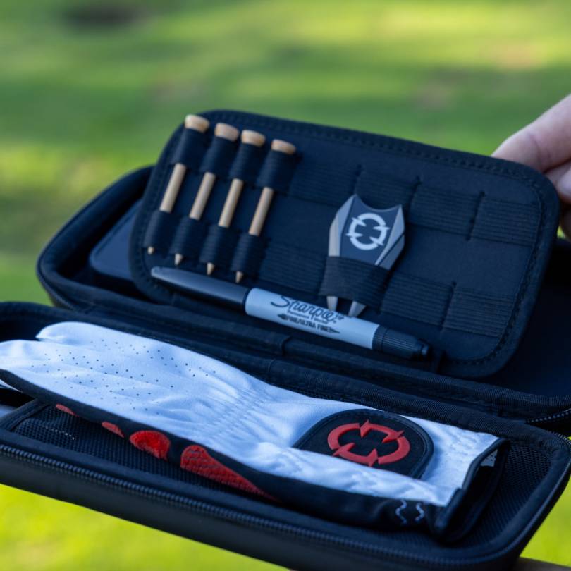 EXO Glove Case - open showing how it stores EXO golf glove, sharpie, divot tool and tees