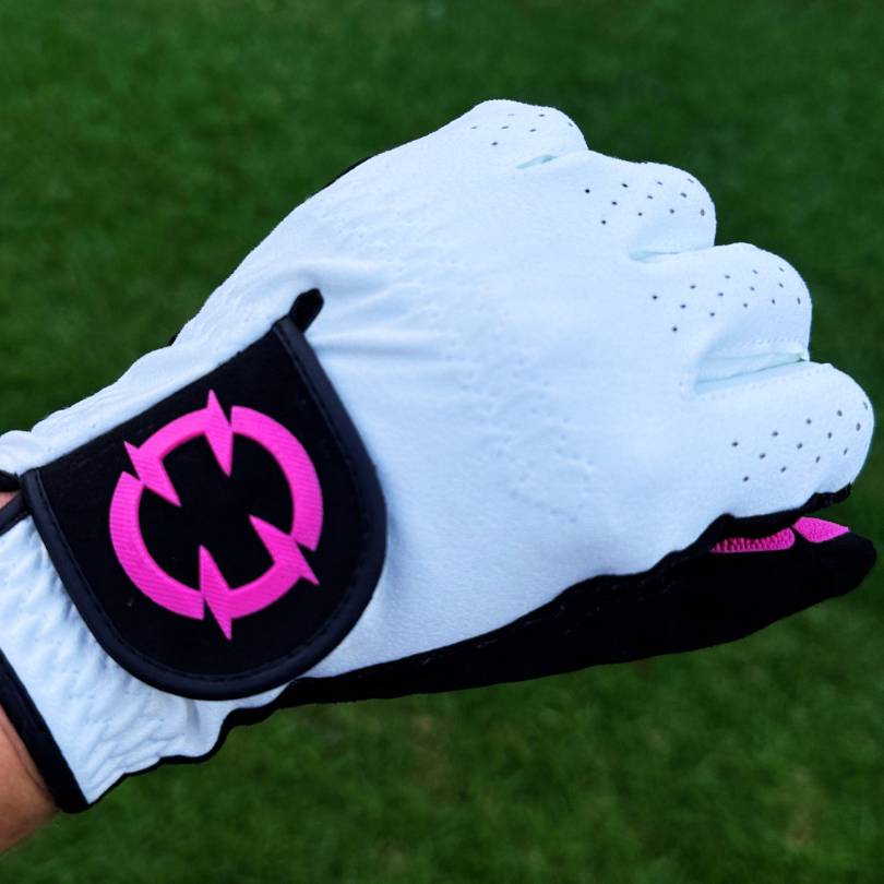 EXO Golf Glove withe pink logo forming a fist