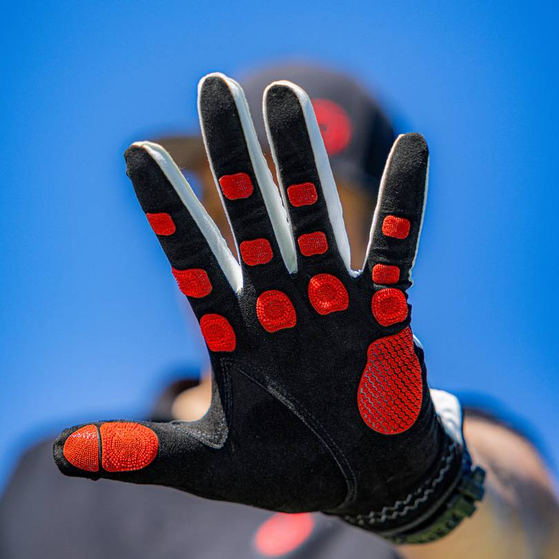 EXO golf glove  - Palm open showing red colorway nanocells on black palm