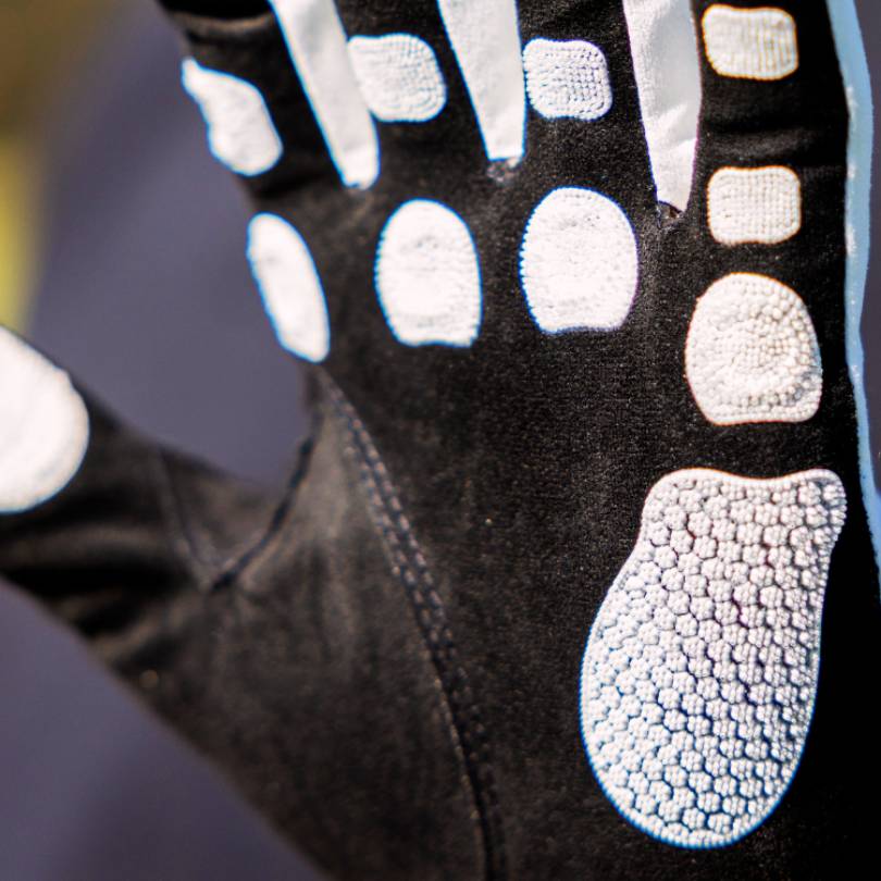 EXO golf glove  - Palm open showing white colorway nanocells on black palm