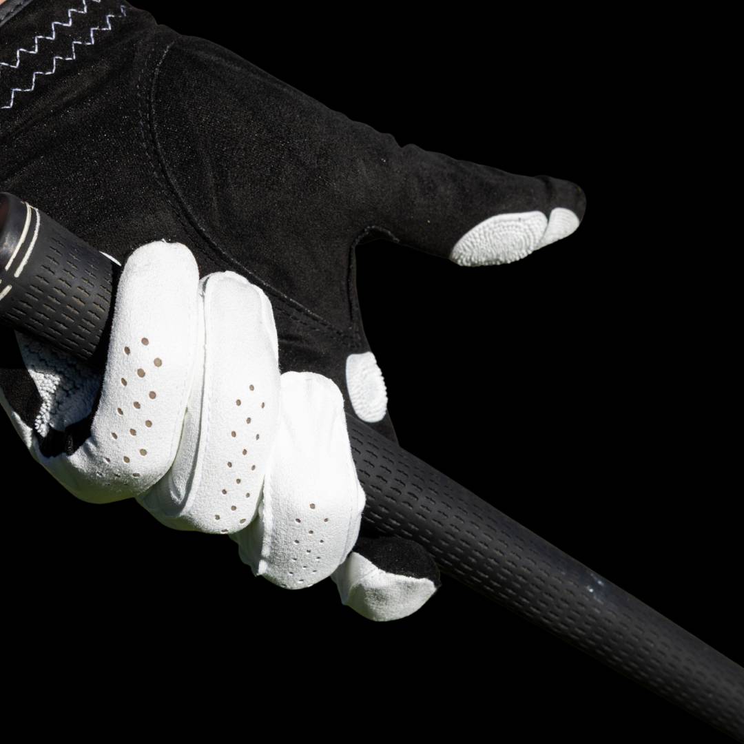 EXO Golf Glove with white nanocells gripping a golf club 